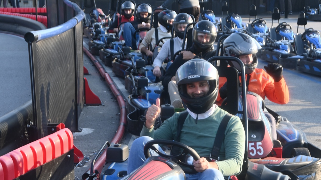 Alterset team lined up in karts at KartLand Ada Huja
